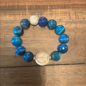 Costume Beaded Blue Peace Sign Stretch Bracelet